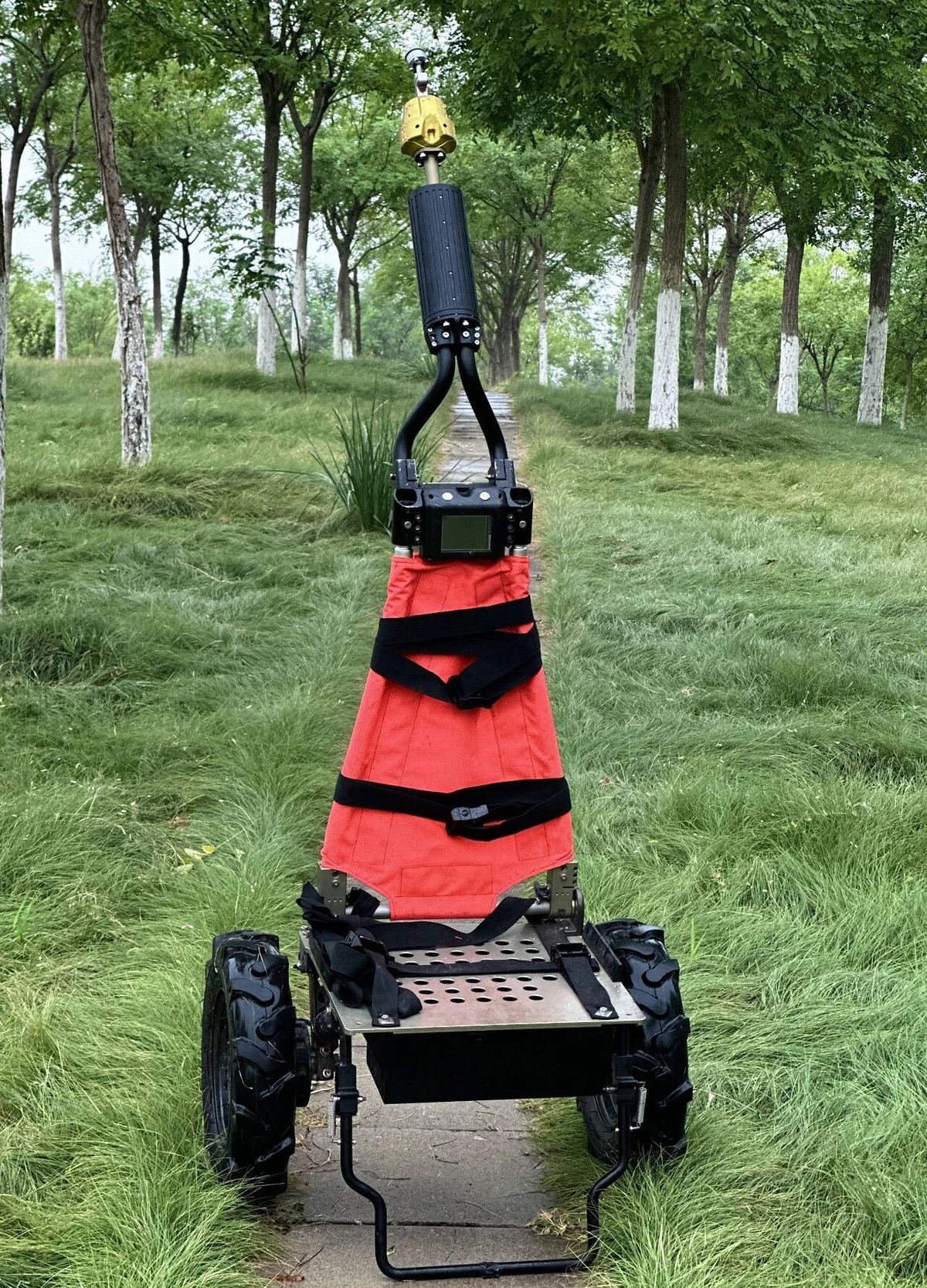 Rider all-terrain intelligent carrier shown from the front on a field path